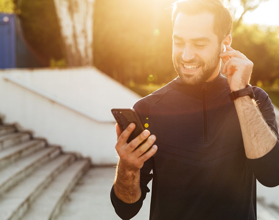 man looking at phone